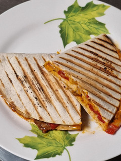 Una foto de Wrap de lomo, pimientos y queso