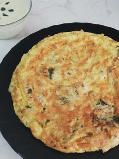 Una foto de Tortilla de boquerones al ajillo