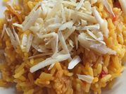 Una foto de arroz con pulpo y mejillones