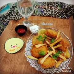Chicken Nuggets With French Fries A picture of Chicken Nuggets With French Fries.