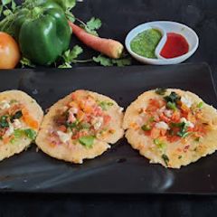 A picture of Oats and vegetables mini uttapam.