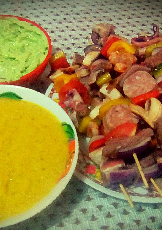Una foto de Brochetas Mar y Tierra