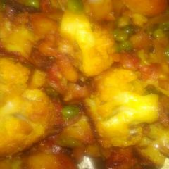 A picture of Fry Gobhi Aloo matar.