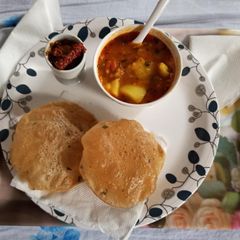 Spicy aalu sabji with kasuri methi puri A picture of Spicy aalu sabji with kasuri methi puri.