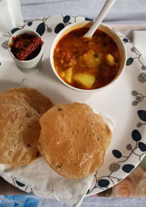 A picture of Spicy aalu sabji with kasuri methi puri.