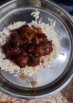 A picture of Veg manchurian with rice.