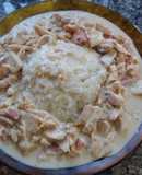 Strogonof de pollo con arroz frito
