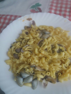 Una foto de Coquinas con fideos