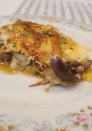 Una foto de Portobellos y los tres quesos con jugo verde