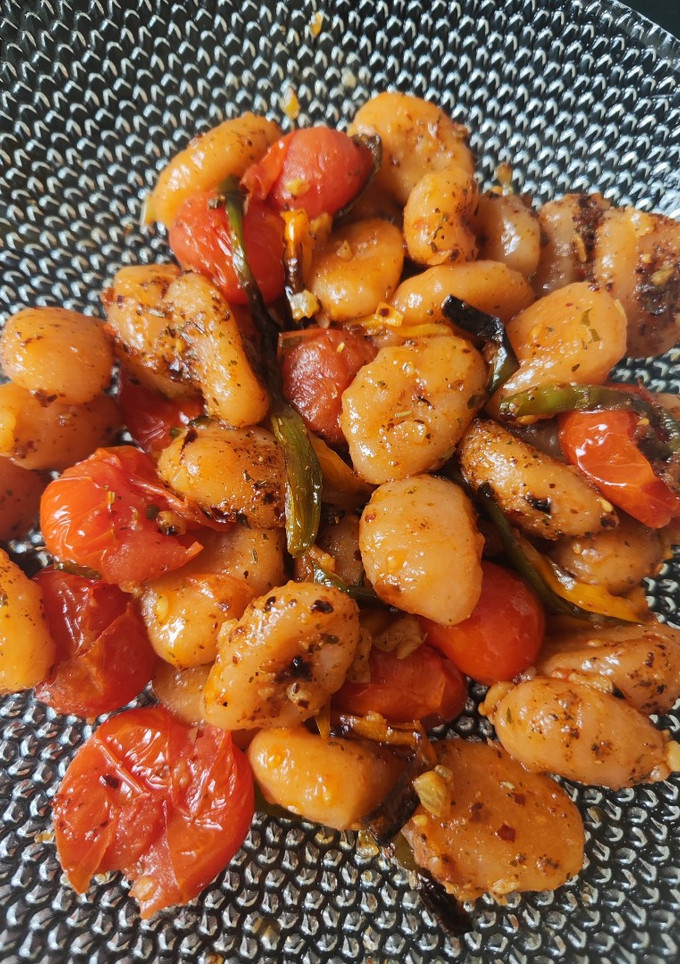 Una foto de Gnocchis con tomate cherry