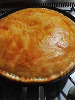 Una foto de Pascualina de espinacas con salsa blanca