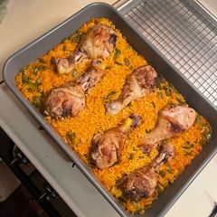 A picture of Spanish Rice & Chicken.