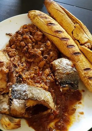 A picture of Grilled plantain,fish and honey beans.
