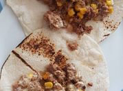 Una foto de carne molida y elotes