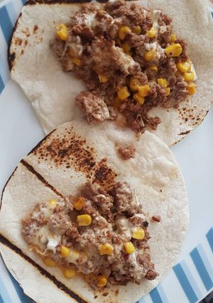 Una foto de Picadillo con chipotle elote y queso