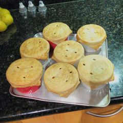 A picture of Chicken pie with fruit plater.