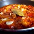 Abadejo en salsa de tomate y pimientos del piquillo