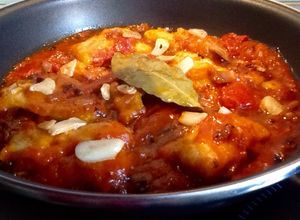 Foto principal de Abadejo en salsa de tomate y pimientos del piquillo
