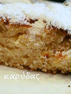 Φωτογραφία της συνταγής Αφράτο κέικ καρύδας με πορτοκάλι