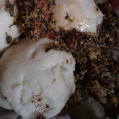 A picture of Pounded yam and egusi soup.