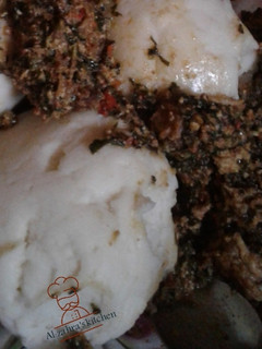 A picture of Pounded yam and egusi soup.