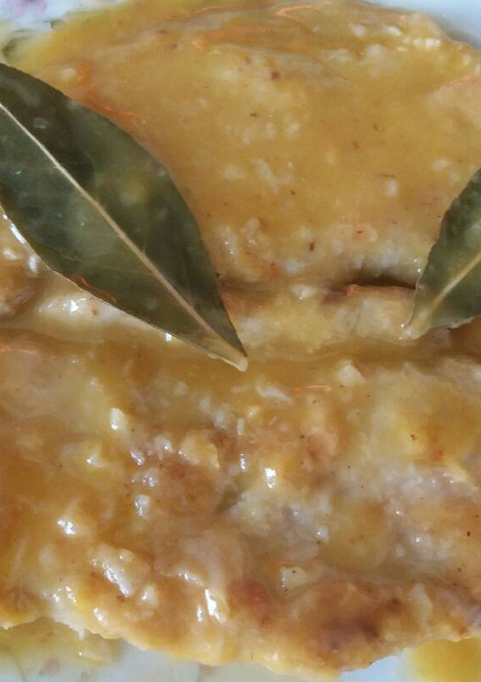 Una foto de Filetes de magro de cerdo en salsa de naranja🍊🌿