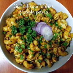 A picture of Masala pasta 🫛🍅🧅.