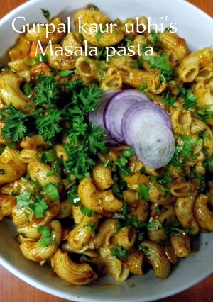 A picture of Masala pasta 🫛🍅🧅.