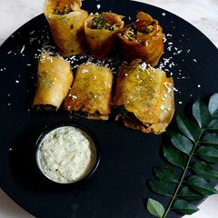 A picture of Palak Paneer Dosa.
