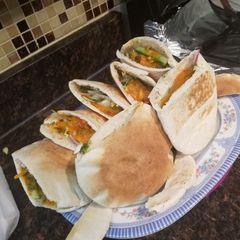 A picture of Chicken vegetable shawarma.