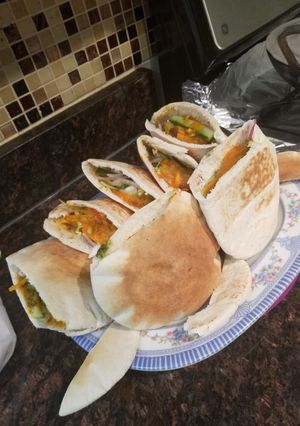 A picture of Chicken vegetable shawarma.