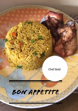 A picture of Fried rice and Chicken.