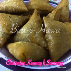 A picture of Qeemay k Samosay (How to wrap samosa step by step).