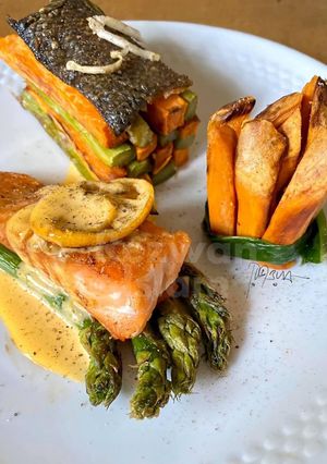 A picture of “Gourmet(ish)” salmon with asparagus and sweet potatoes.