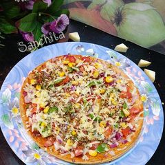 A picture of Jowar-Bajra Khakhra Pizza.