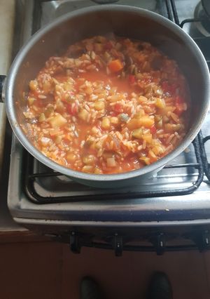 Una foto de Zucchini con arroz