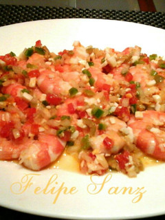 Una foto de Langostinos en salsa de vinagreta