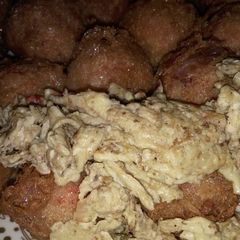 A picture of Yam balls, step by step on how to make it.
