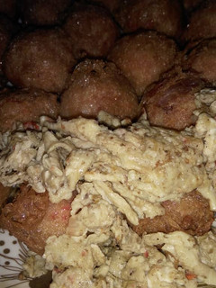 A picture of Yam balls, step by step on how to make it.
