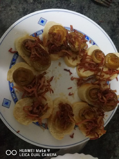 Una foto de Champis jamoneros