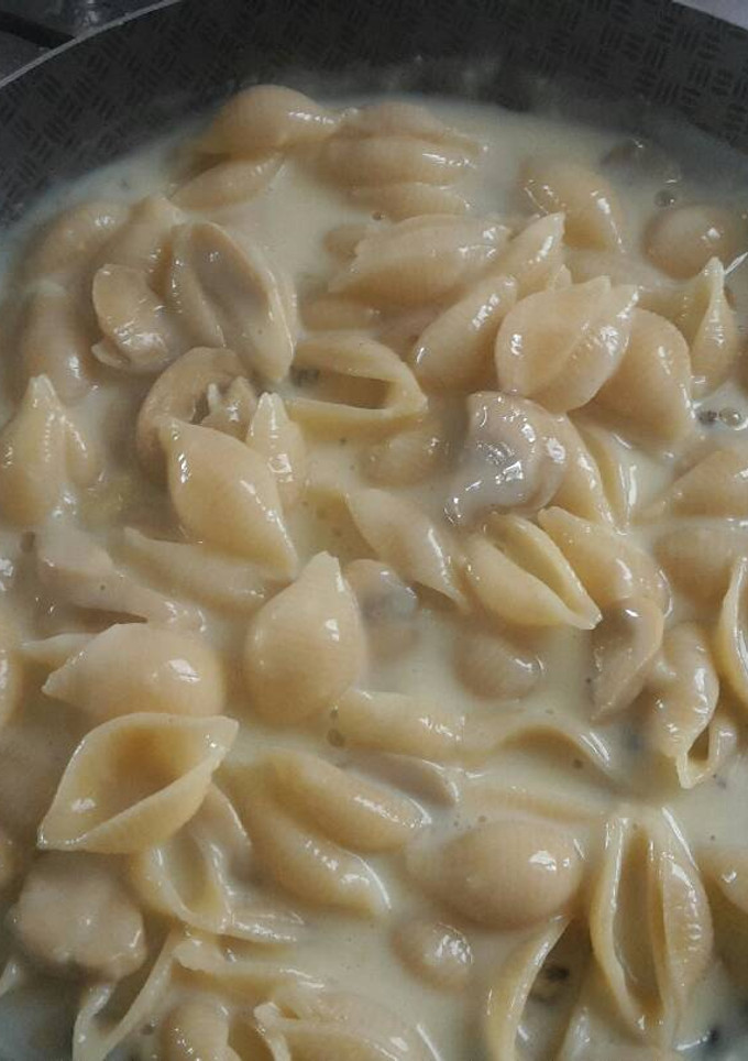 Una foto de Caracolitos en crema de hongos