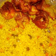 A picture of Fried Rice with chicken.