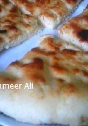 A picture of Homemade tawa Naan.