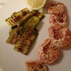 A picture of Grilled prawns and zucchine.