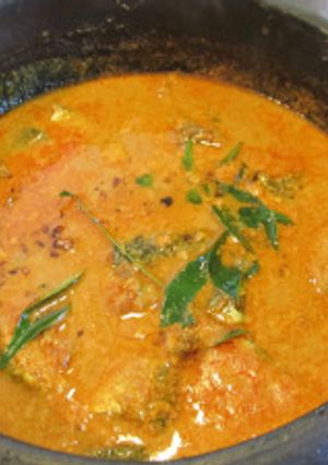 A picture of Kerala Style Fish Curry using green mangoes or kodampuli.