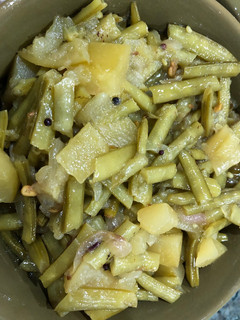 A picture of Cluster bean curry with raw mango.
