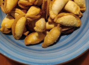 Una foto de Tortelines fritos - picada