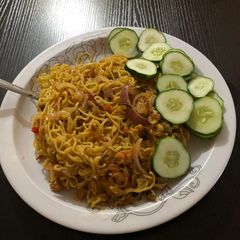 Indomie wit cucumber A picture of Indomie wit cucumber.