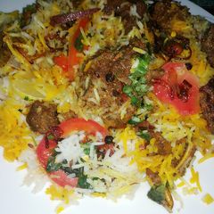 A picture of Mutton tikkah boti biryani.