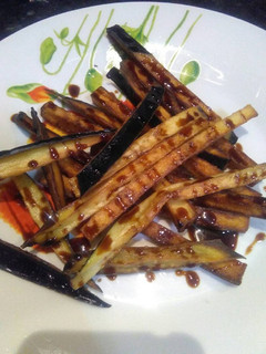 Una foto de Berenjenas fritas con miel de caña